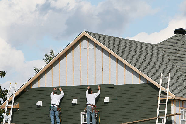 Professional Siding Contractor technician working in Barton, OH
